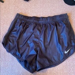Nike athletic shorts in dark blue. Size M.